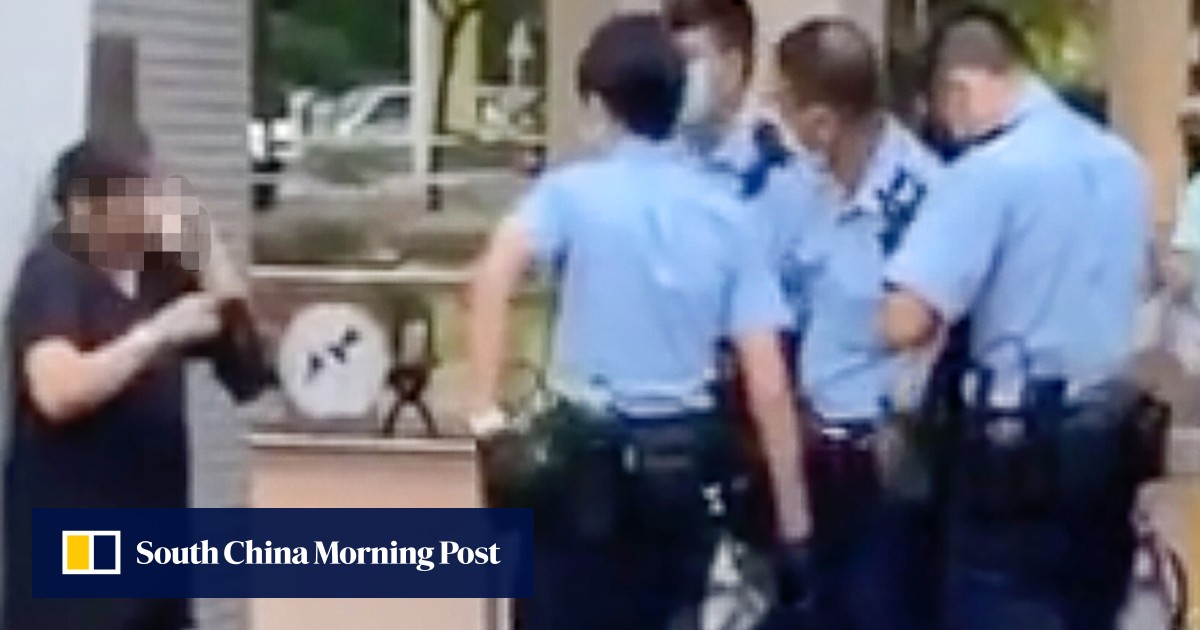 Coronavirus police use pepper spray to subdue Hong Kong woman who