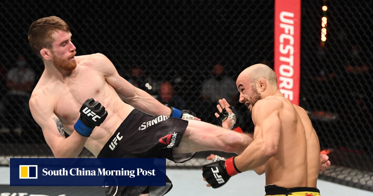 UFC Cory Sandhagen gets spinning wheel kick TKO vs Marlon Moraes