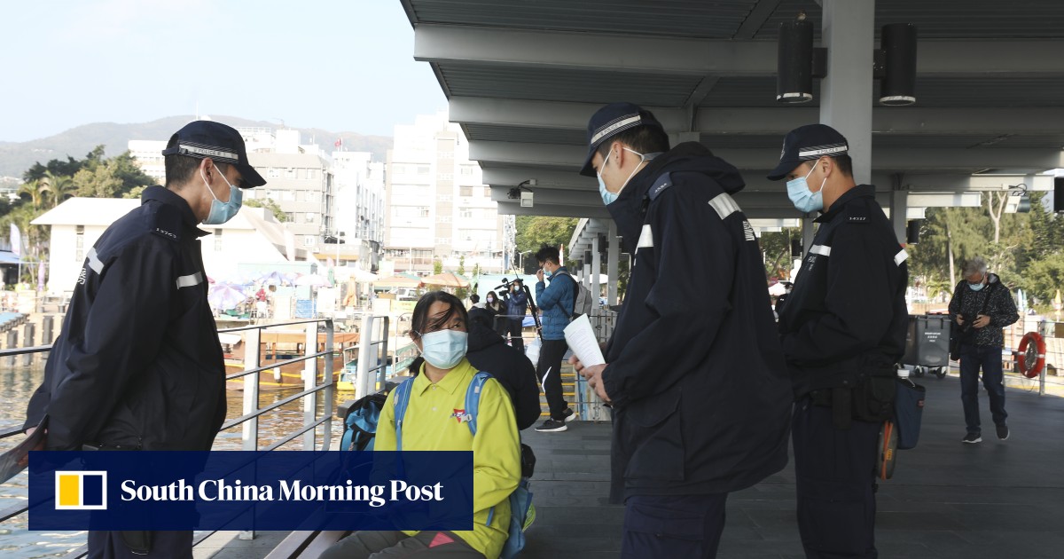 Hong Kong police coronavirus hotline buzzing with calls about suspected