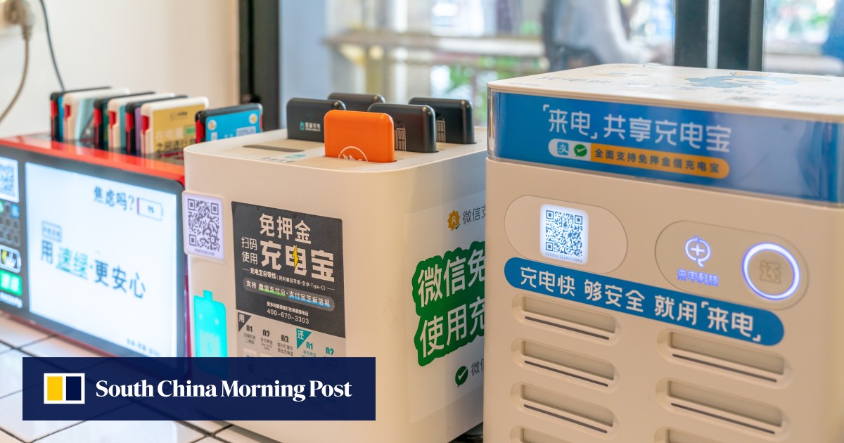 Charging stations for shared power banks are displayed, with one device showing signs of digital security warnings related to spy risks.