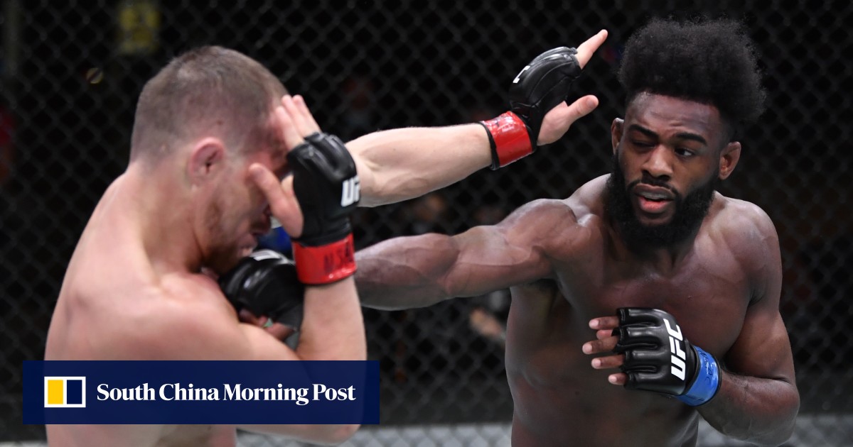UFC 259 Aljamain Sterling wins bantamweight title, throws it away as