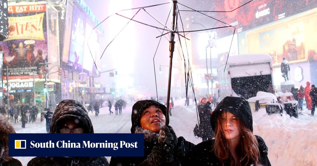 16 reported dead as huge snowstorm buries much of the US East Coast ...
