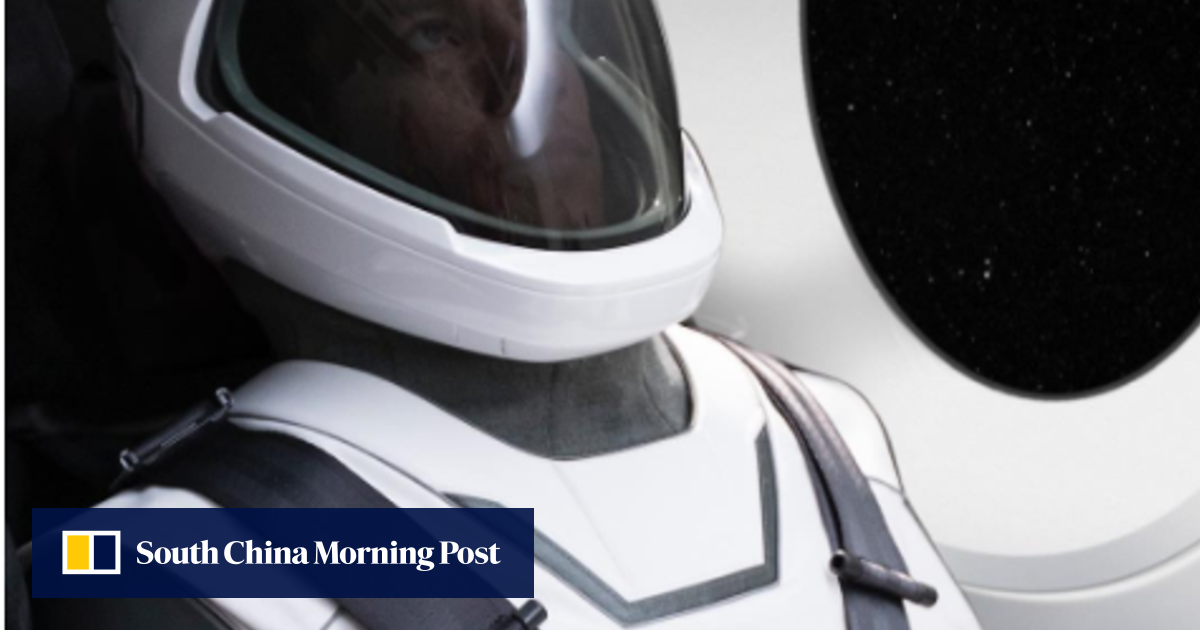 Elon musk unveils the spacex spacesuit