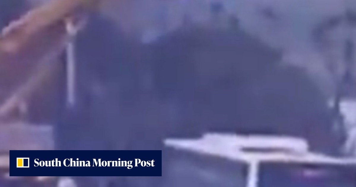 Chinese crane driver labelled a hero after winching four people from ...