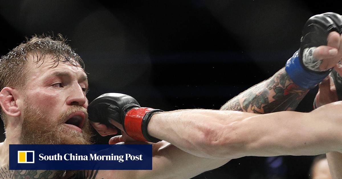 Did Conor McGregor throw the first punch in UFC 229 during postfight