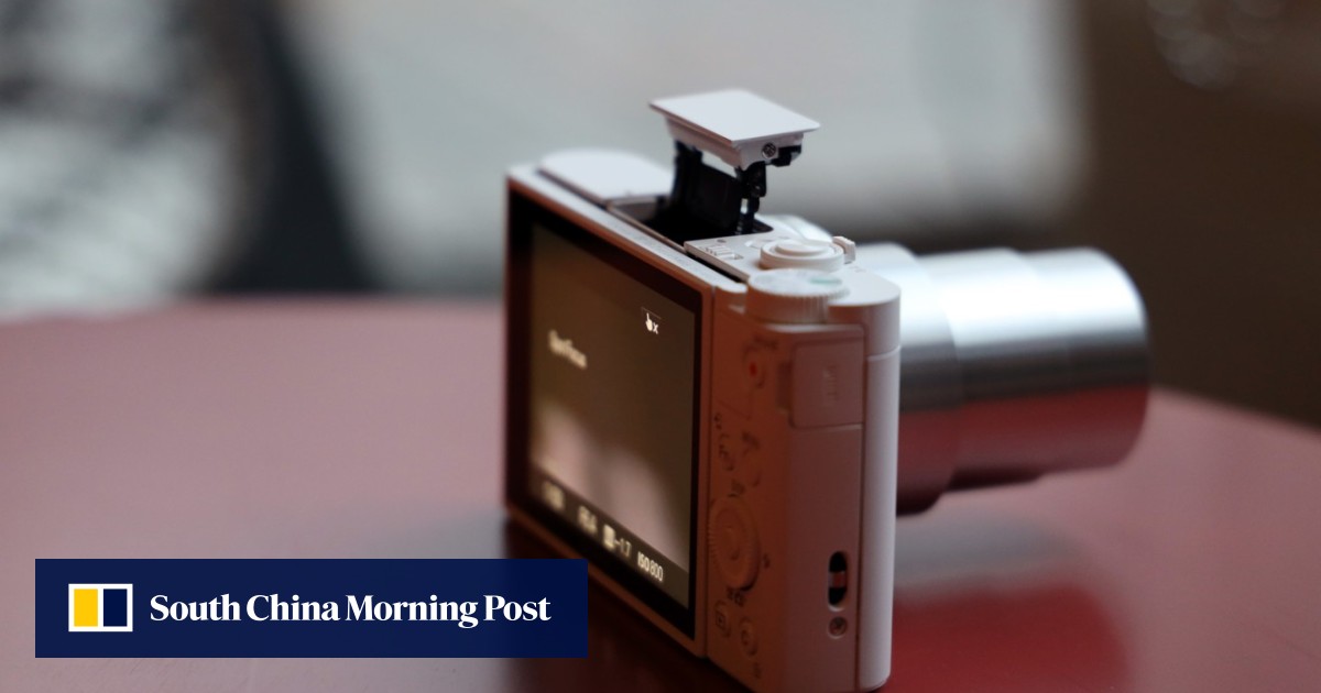 Pocket-sized Sony DSC-WX800 digital camera's zoom lens packs a big