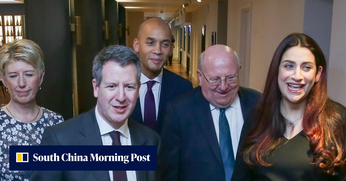Rebel British MPs take up seats in parliament a day after leaving ...