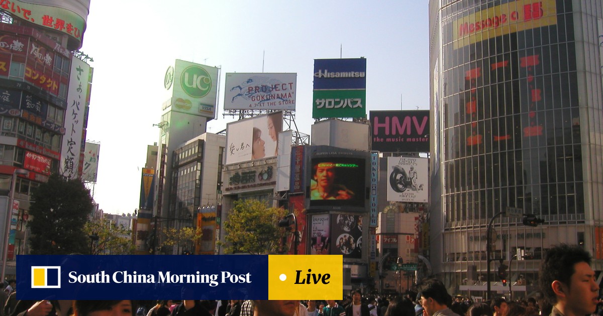 Huge sign of the times for Tokyo's bustling Shibuya pedestrian