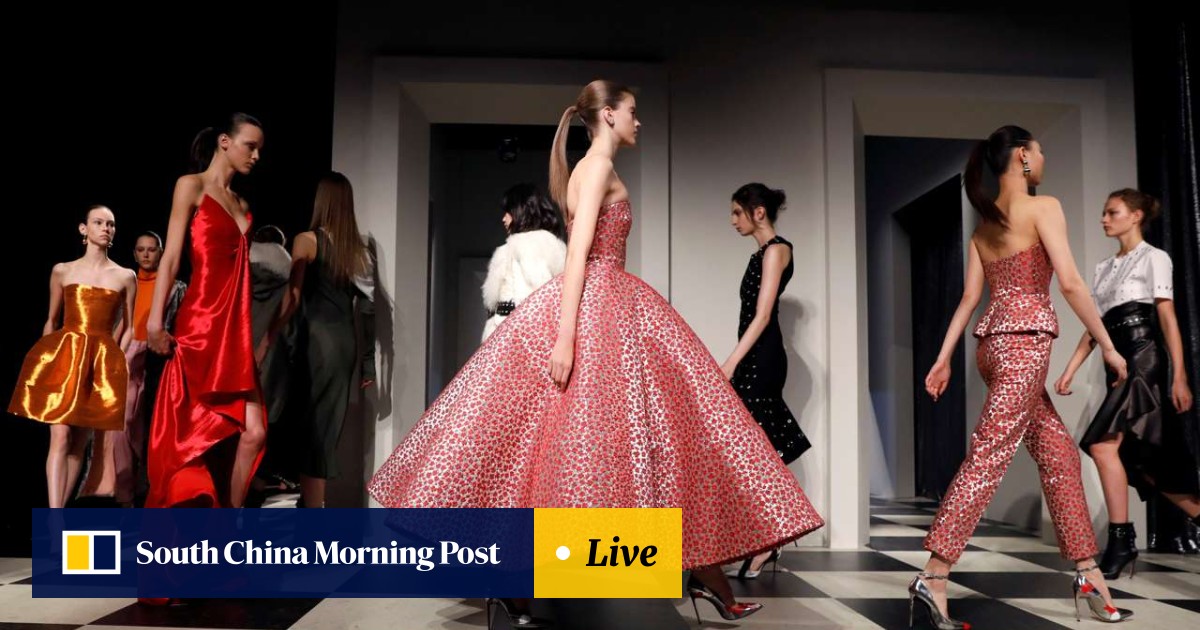 dress created live on runway Model has dress sprayed onto body on Coperni runway