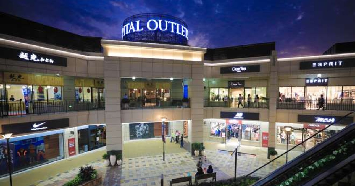 Outlet malls booming in China as department stores feel the pinch South China Morning Post