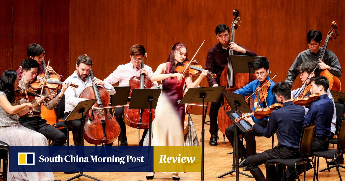 Young violin soloist captivates in Arvo Pärt work with Hong Kong string ensemble, veteran piano soloist doesn’t spare the horses in Grieg concerto