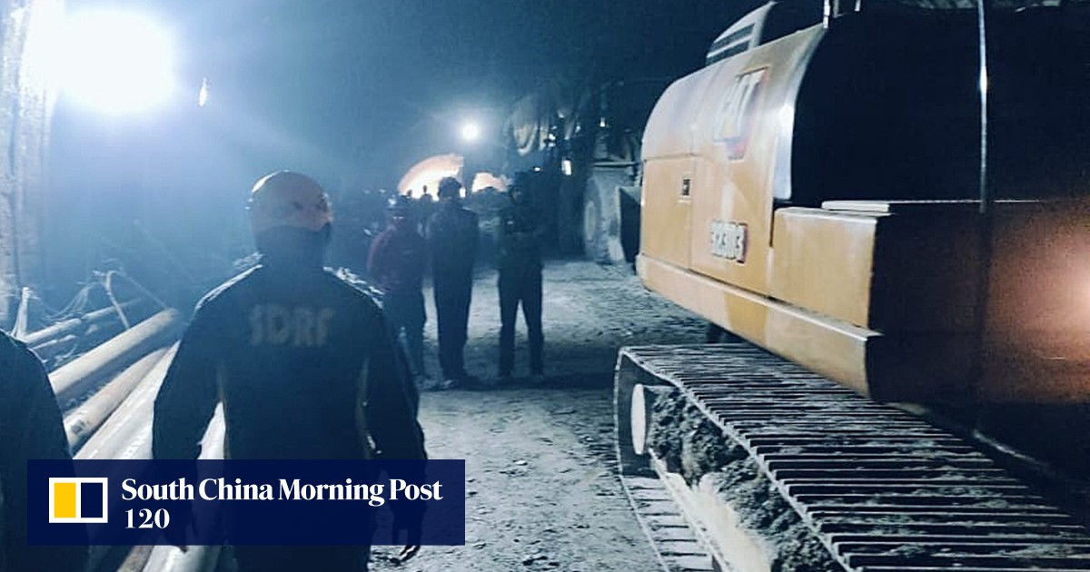 Indian crews try to insert steel pipe to rescue 40 trapped workers from collapsed Himalayan highway tunnel