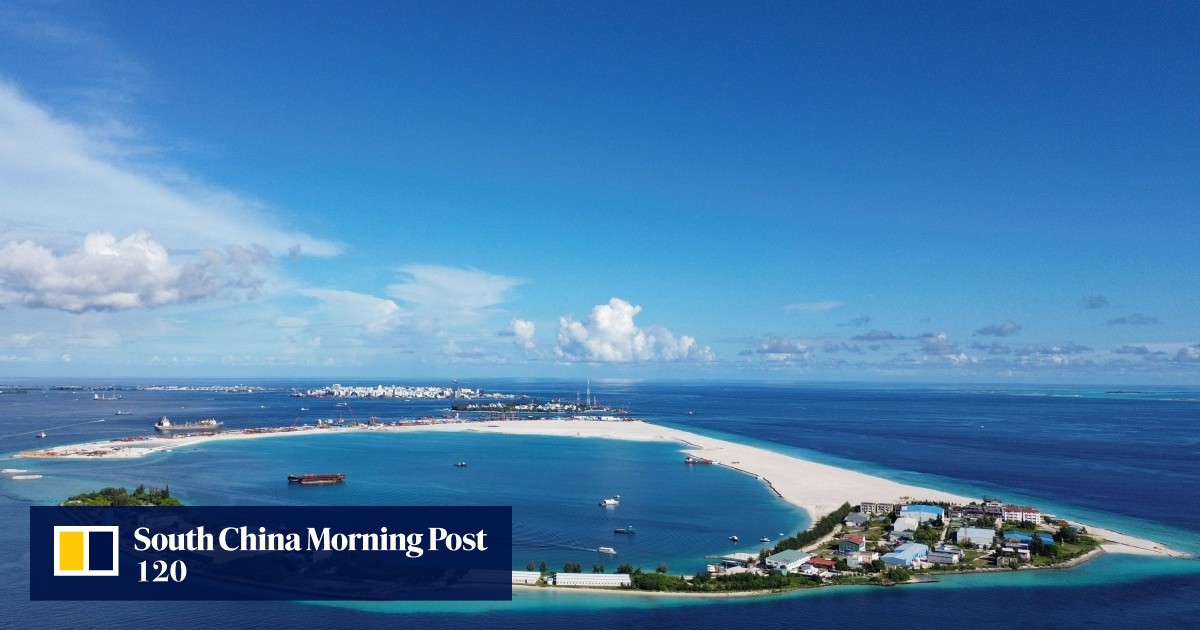Low-lying Maldives vows to stay put, fight rising tides with island building