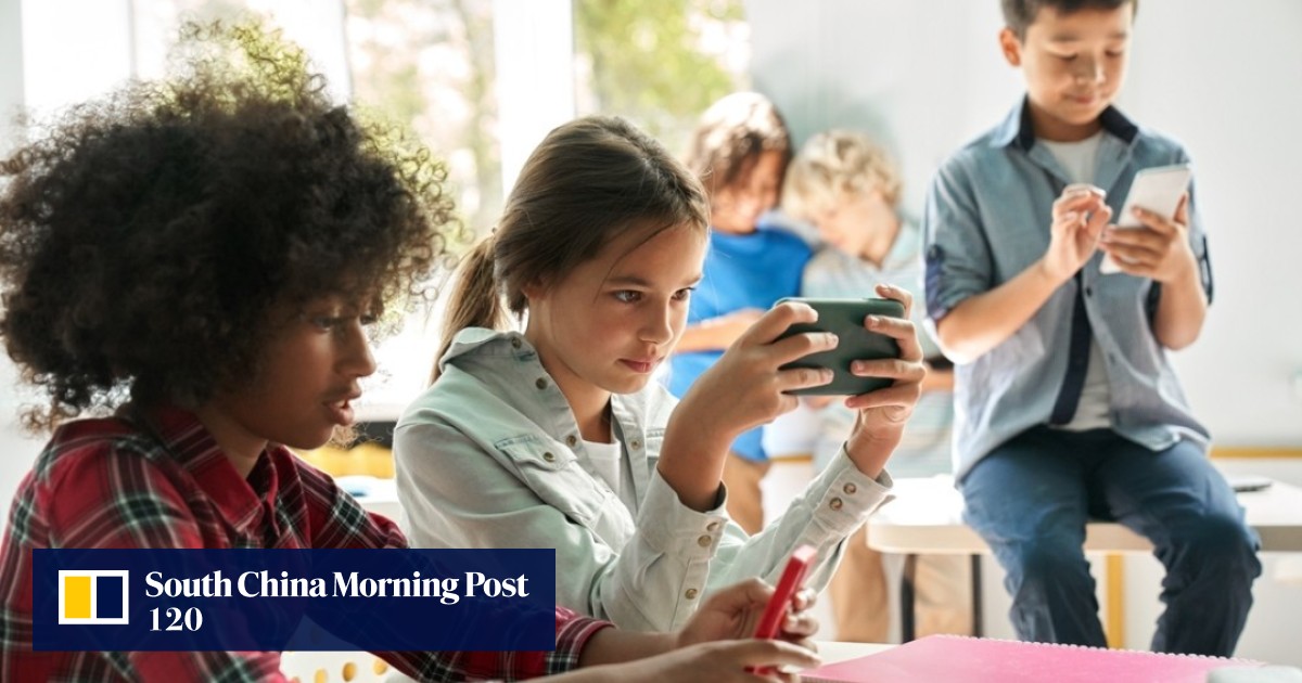 New Zealand to ban mobile phones in schools to tackle classroom ‘literacy crisis’