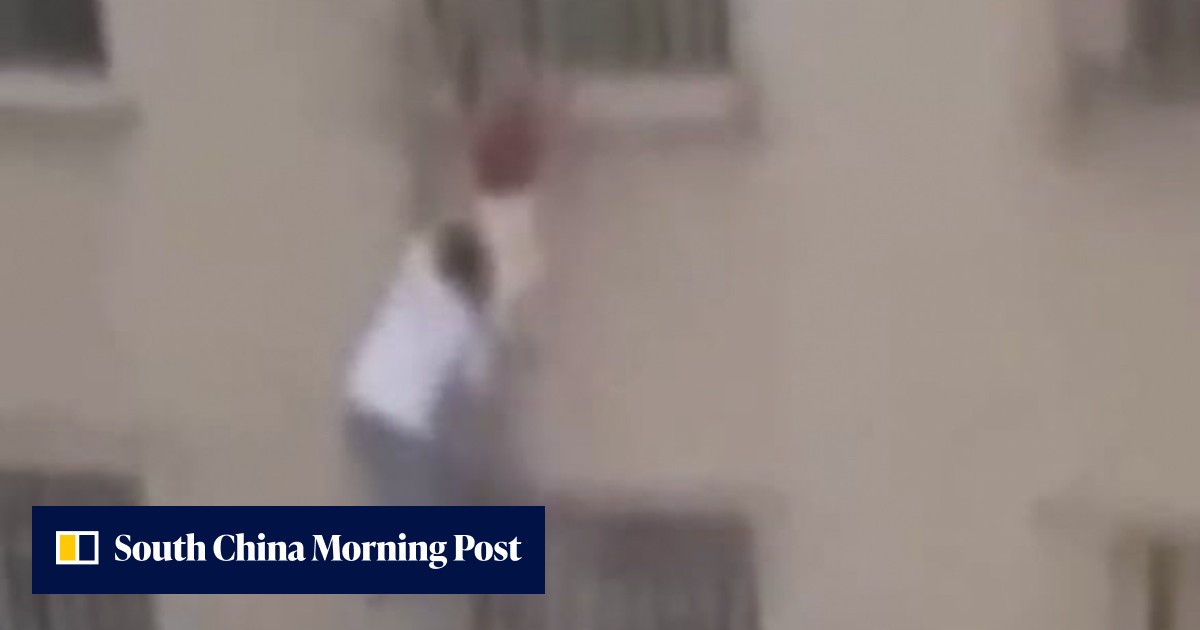 Chinese firefighter 'hero' climbs up six floors with bare hands from outside building to save girl after fall from window left her dangling perilously - Vimarsana News