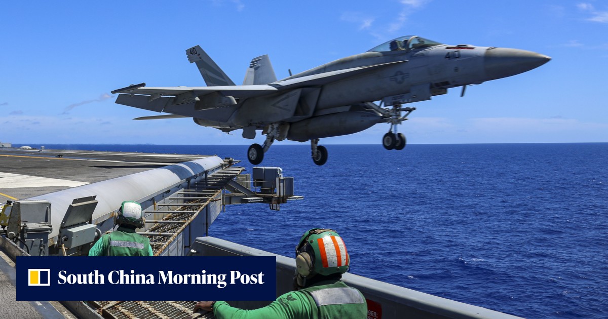 US Navy fishes Super Hornet fighter plane out of sea after wind blows it off aircraft - Vimarsana News