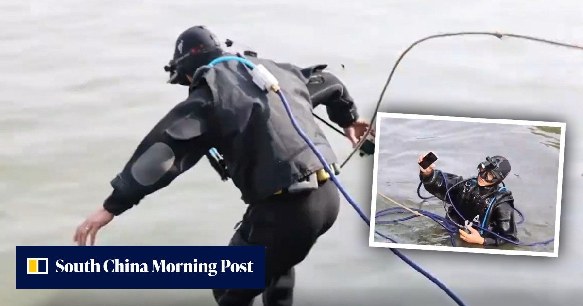 Man salvages mobile phones dropped by tourists in China's famous West Lake, earning up to US$1,500 a day during May Day holiday as domestic tourism booms - Vimarsana News