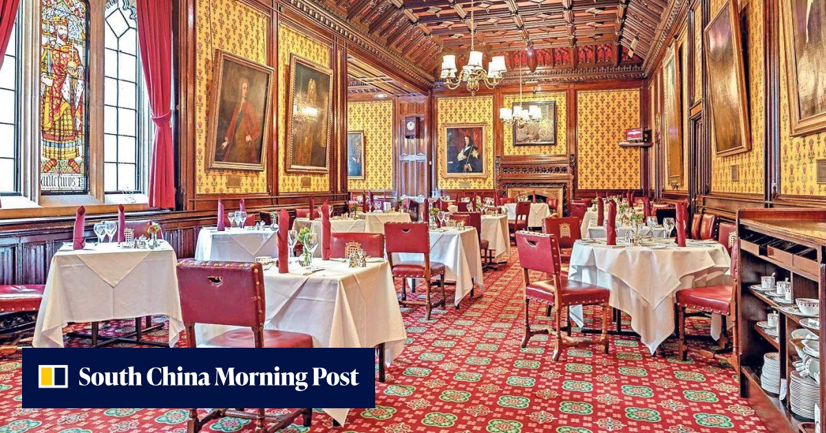 A commoner enjoys a house red and a stately lunch at a rare open day at the Peers' Dining Room at Britain's House of Lords - Vimarsana News