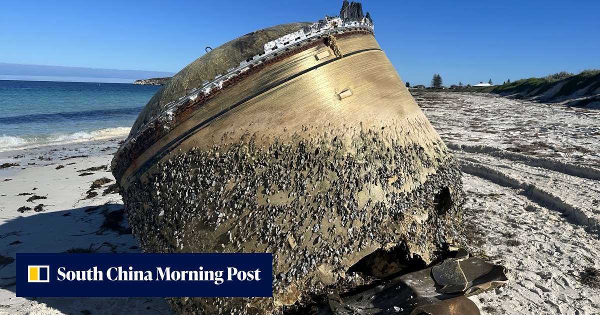 Mystery giant golden cylinder puzzles Australia after washing up on remote beach - Vimarsana News