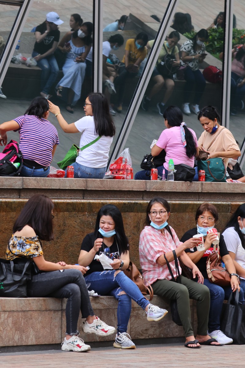 Hong Kong freezes domestic worker wages