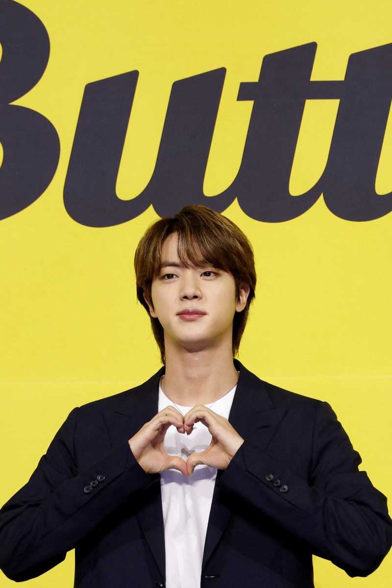 Jin from K-pop super group BTS begins mandatory military service in ...