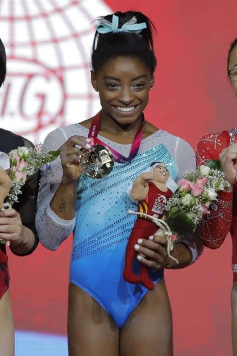 US gymnastics star Simone Biles becomes the first woman ever to win ...