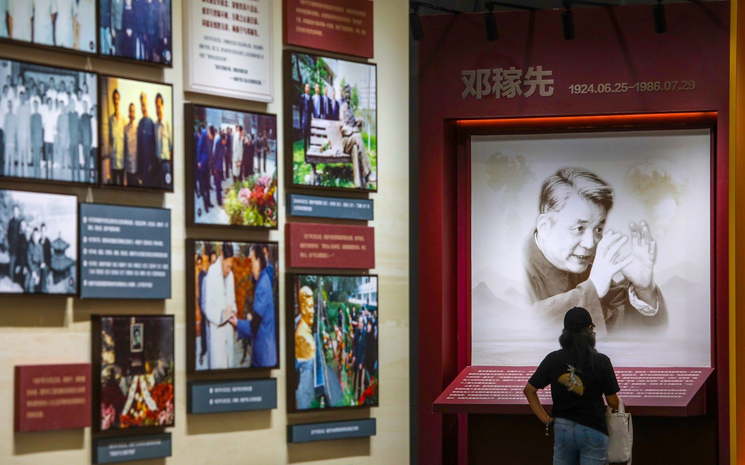 A visitor at an exhibition in commemoration of the centenary of Deng Jiaxian’s birth. Photo: Simon Song
