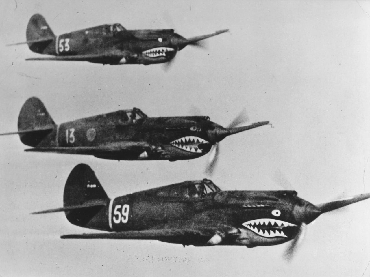 American Volunteer Group aircraft, known by the Chinese as “Flying Tigers”, flying in tight formation on the Far Eastern front, where they aided the Chinese Army against the Japanese. Photo: Getty