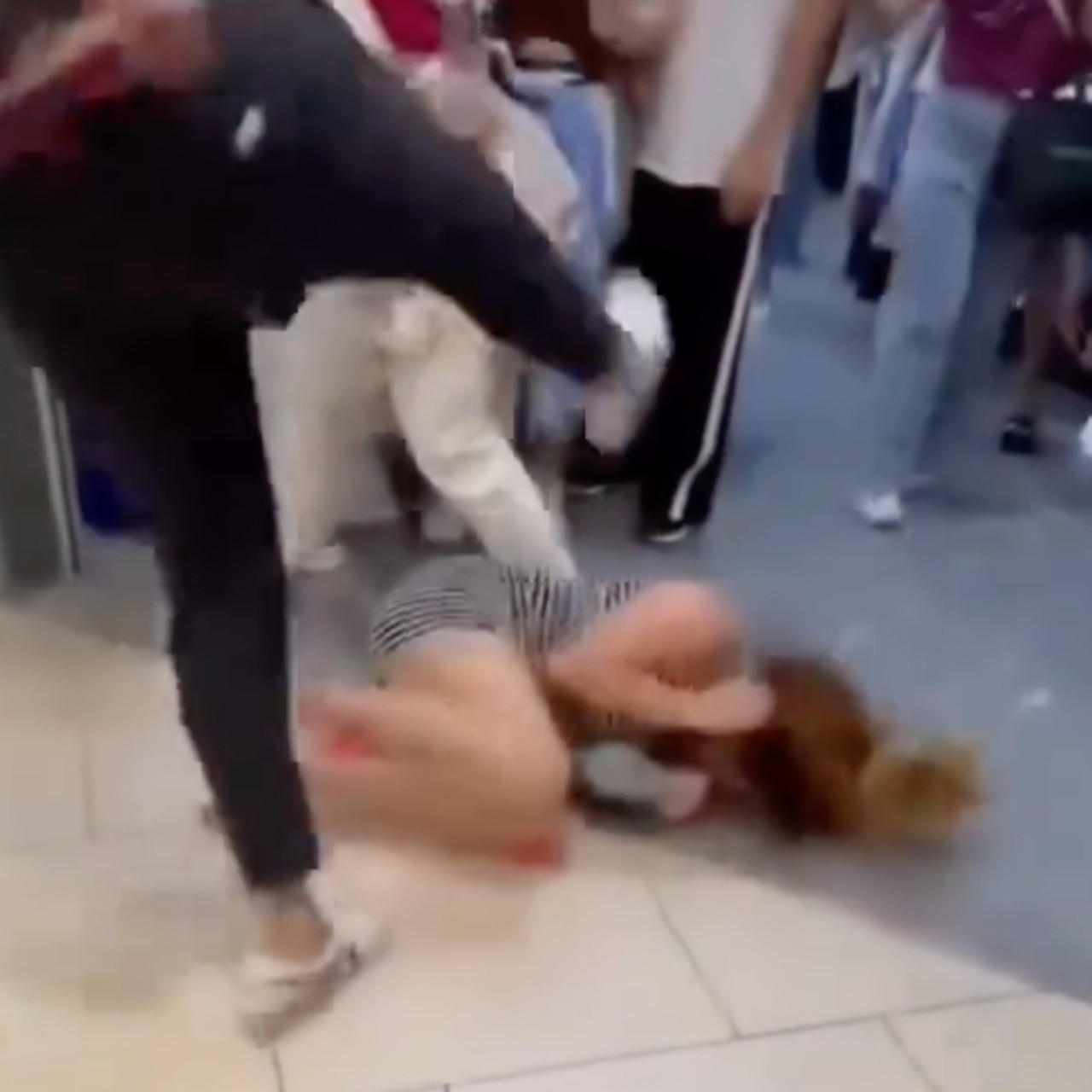 A still from a social media video showing the assault at a shopping centre in Singapore. Photo: Handout