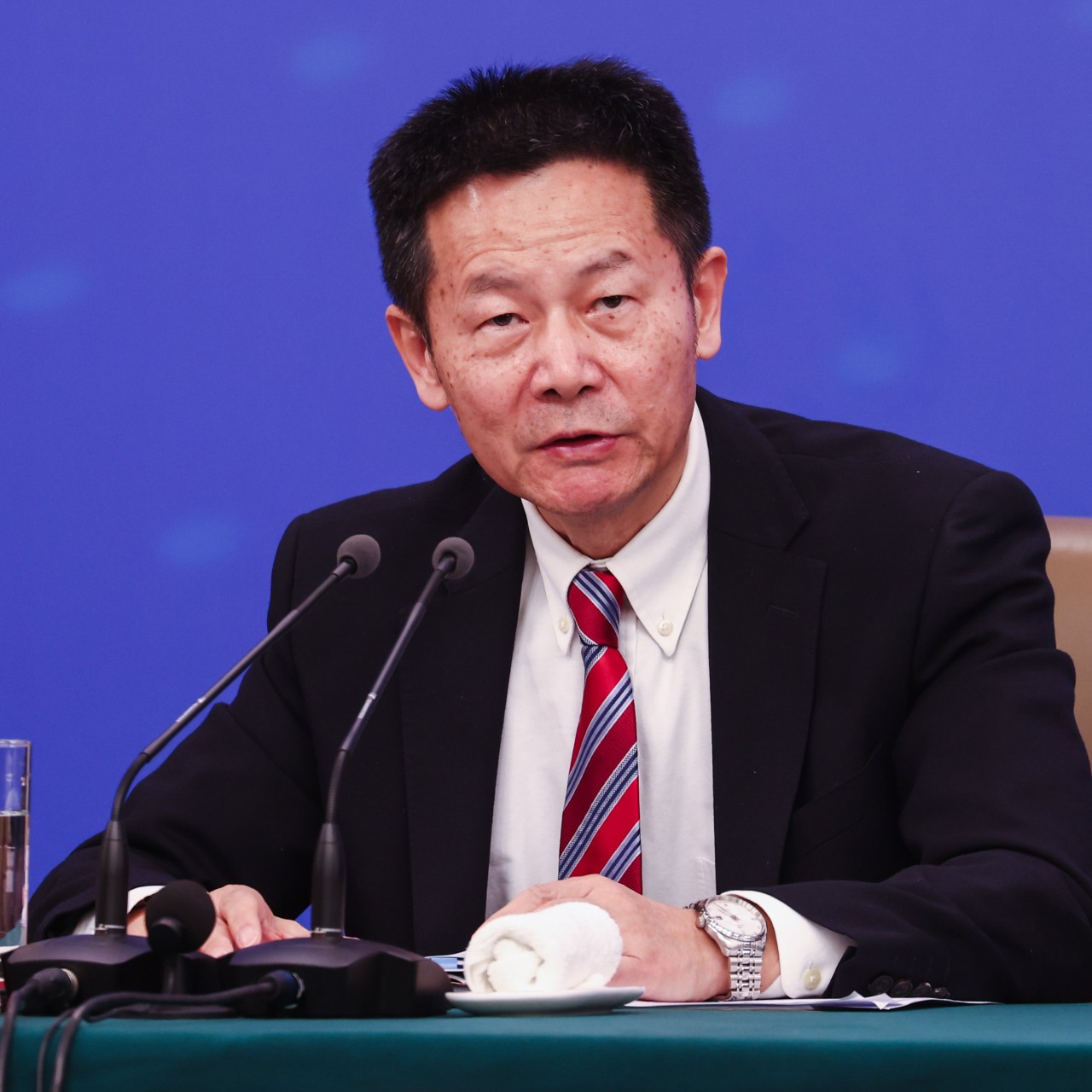 Wu Qing, chairman of the China Securities Regulatory Commission, speaks at a press conference during the Fourth Session of the National People’s Congress in Beijing on March 6, 2026. Photo: EPA