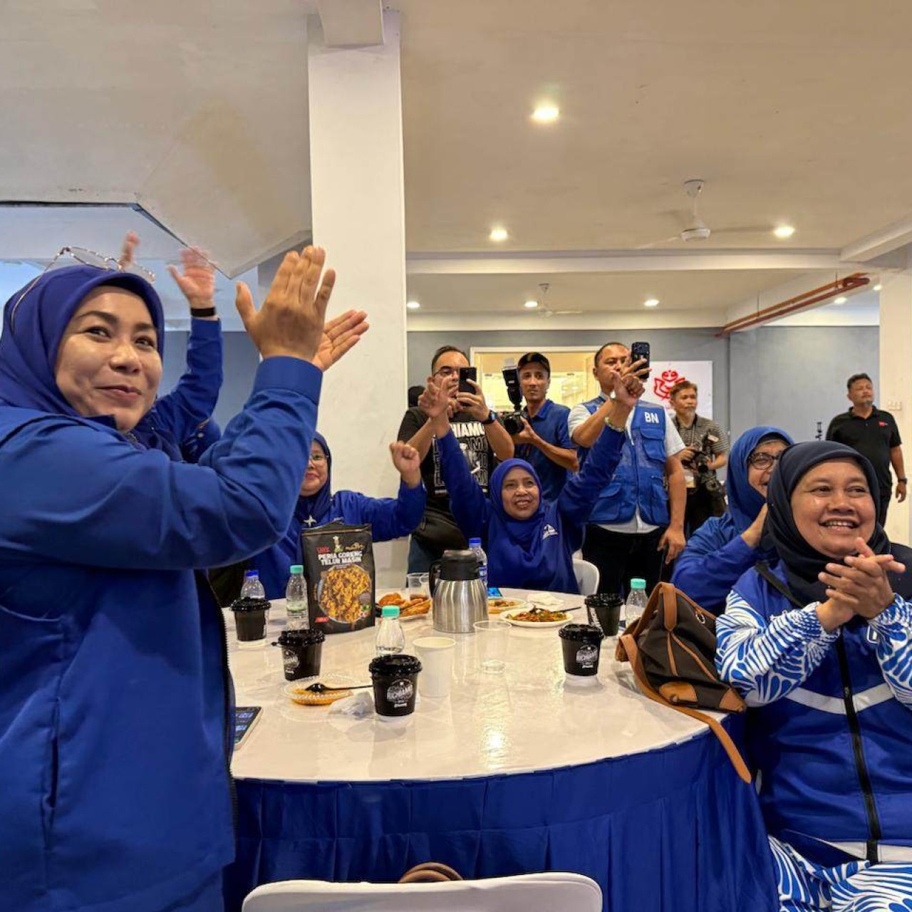 Barisan Nasional supporters celebrate at the coalition’s Johor Bahru command centre during Saturday’s election. Photo: Iman Muttaqin Yusof