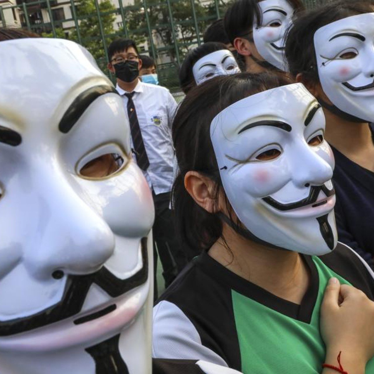 Hugo Weaving, with the Guy Fawkes mask he wore in V for Vendetta.