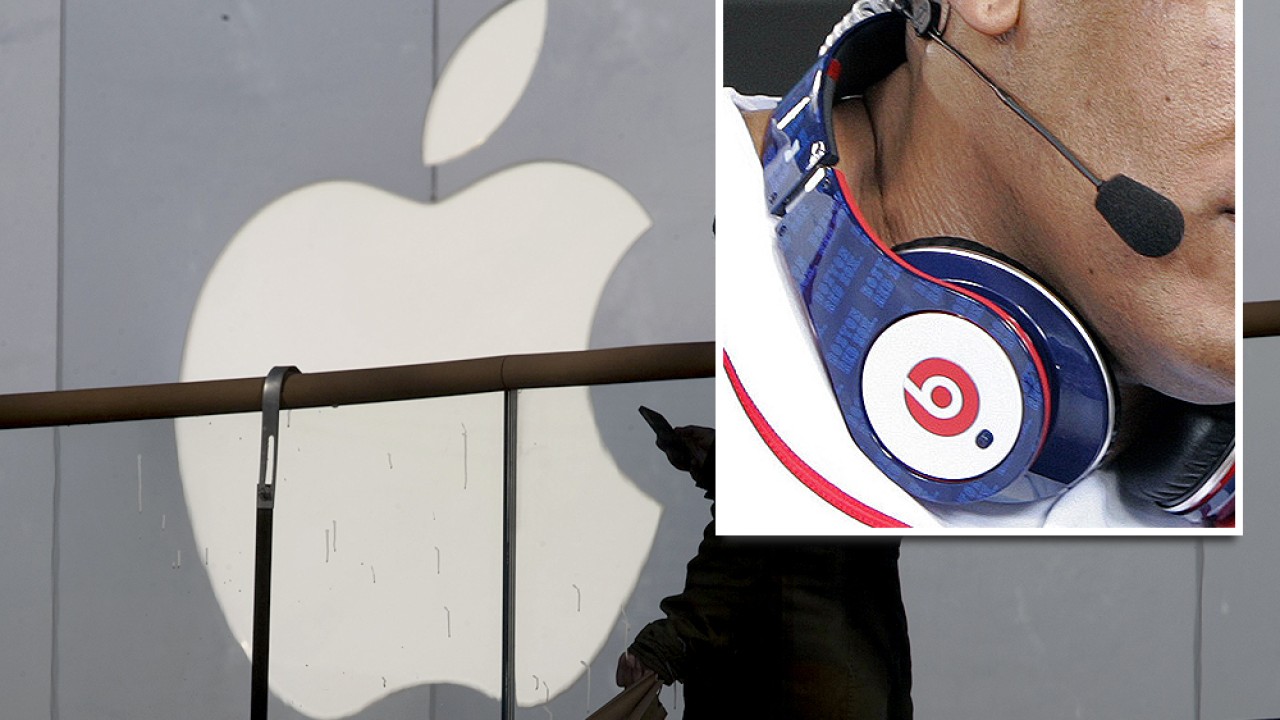 Apple said to be close to buying Dr Dre s Beats Electronics for US