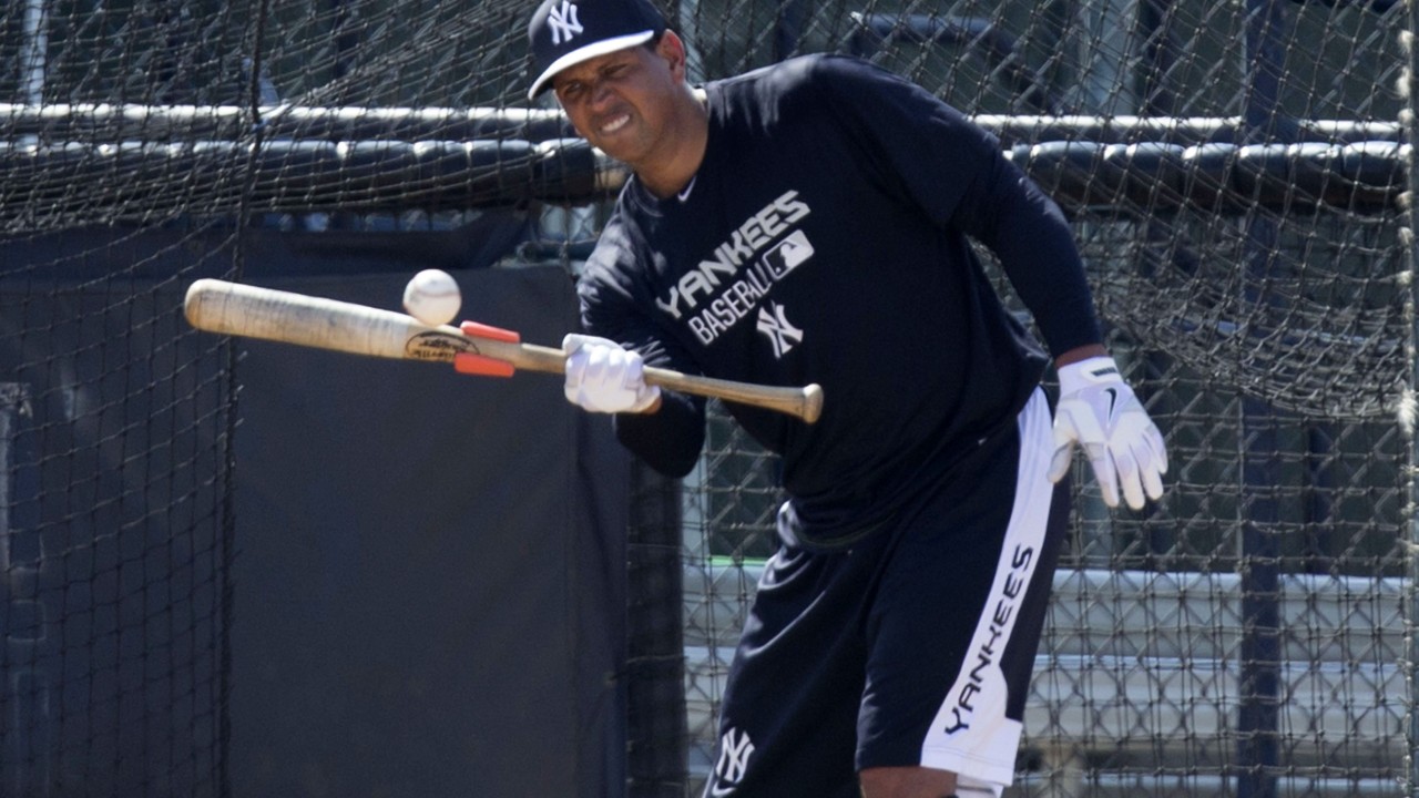 The New York Yankees' Alex Rodriguez takes fielding practice with