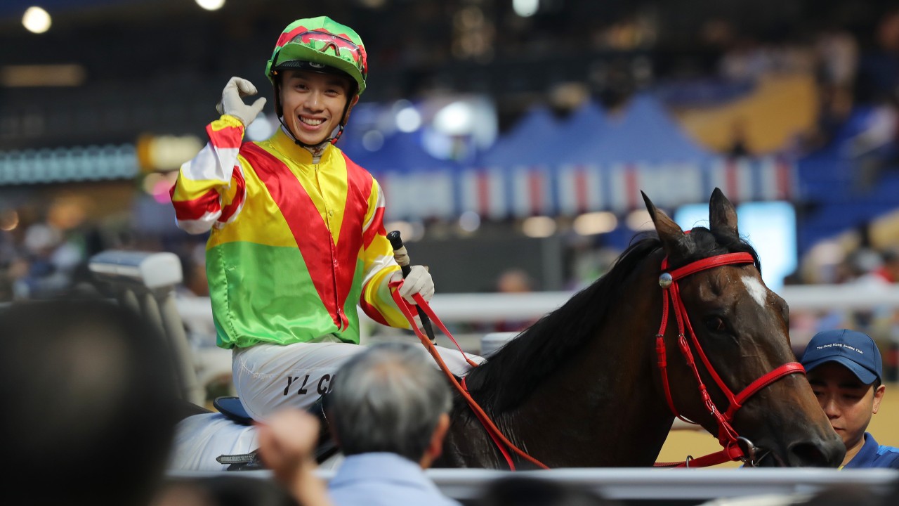 Angus Chung is all smiles after saluting aboard Hero Star on Wednesday night. Photos: Kenneth Chan