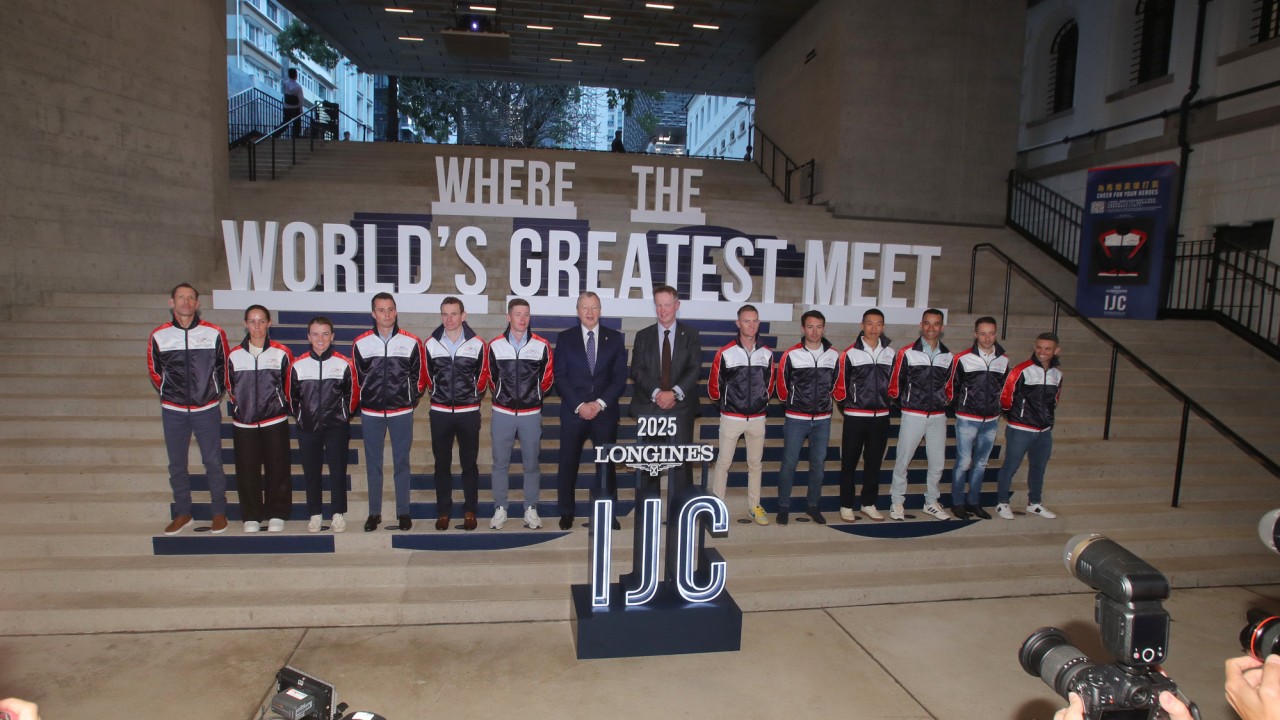 Jockeys and officials pose for a photo at Wednesday night’s IJC press conference at Tai Kwun.