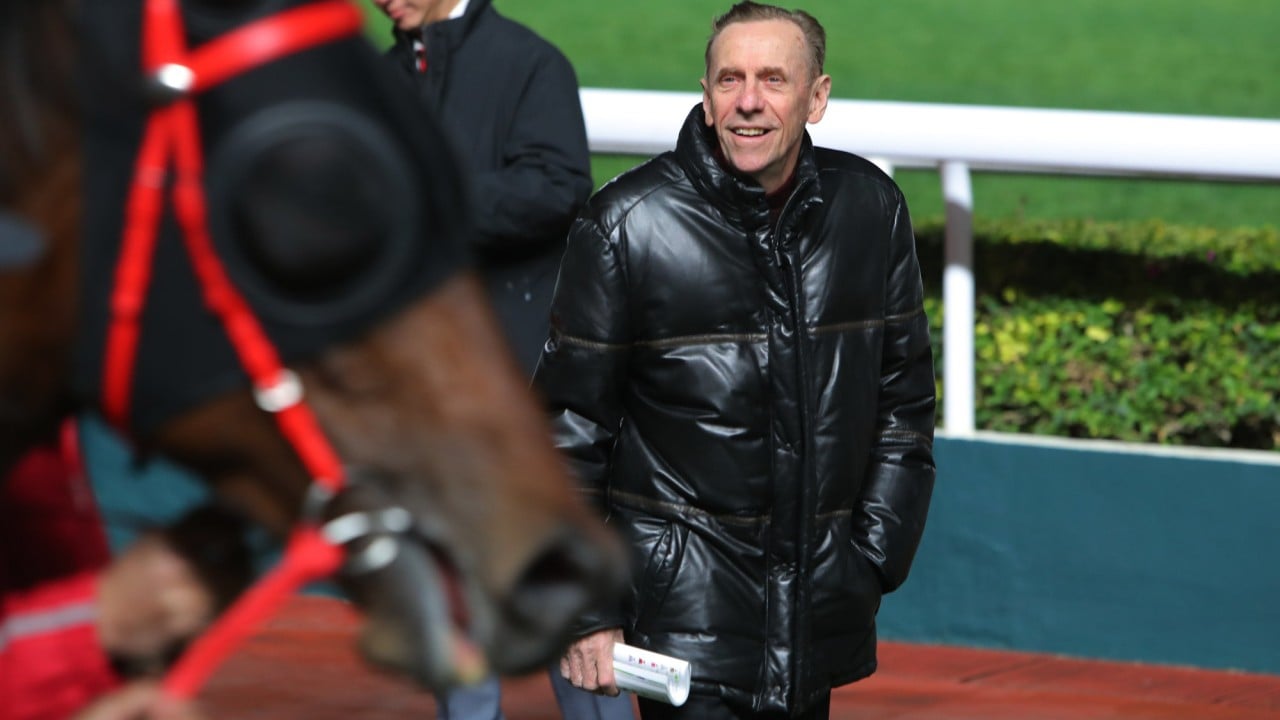 Trainer John Size is all smiles.