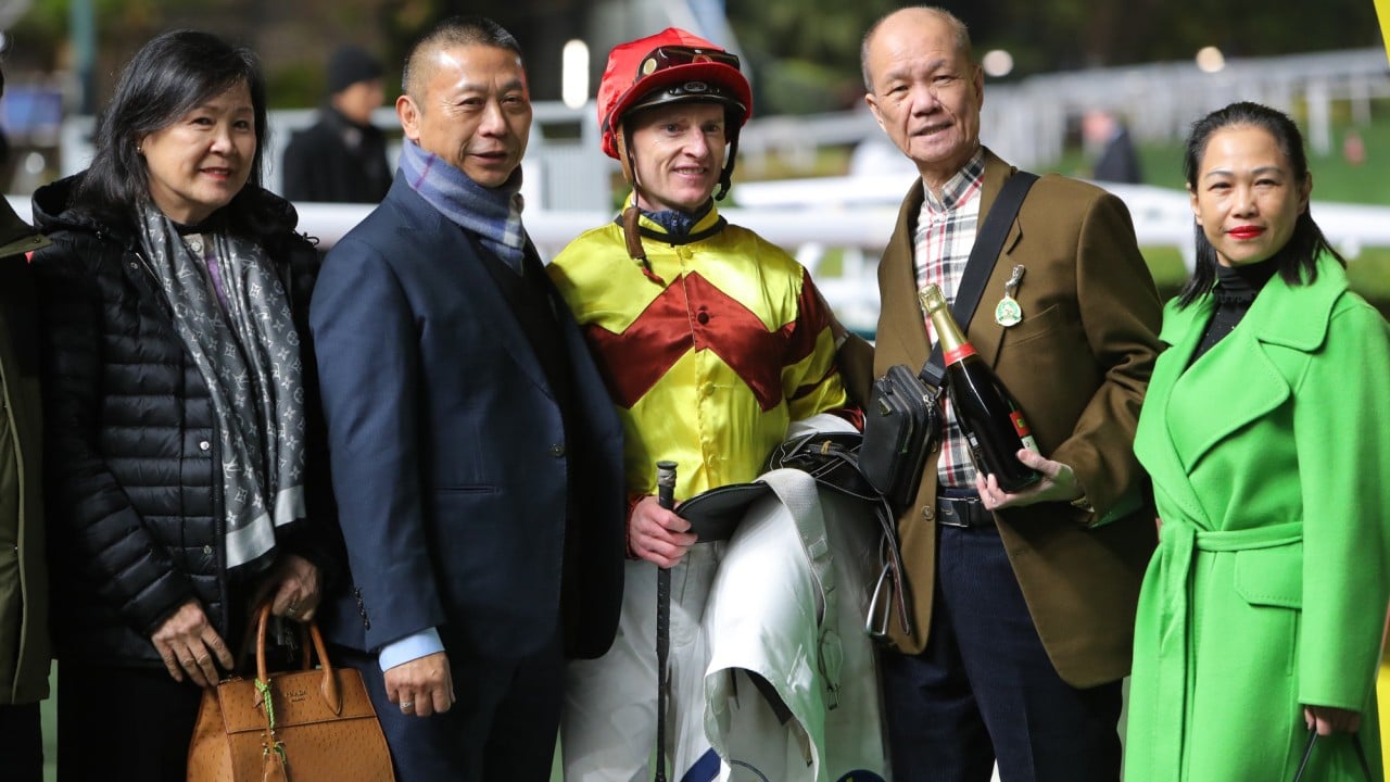 Trainer Danny Shum (second left) and jockey Zac Purton.