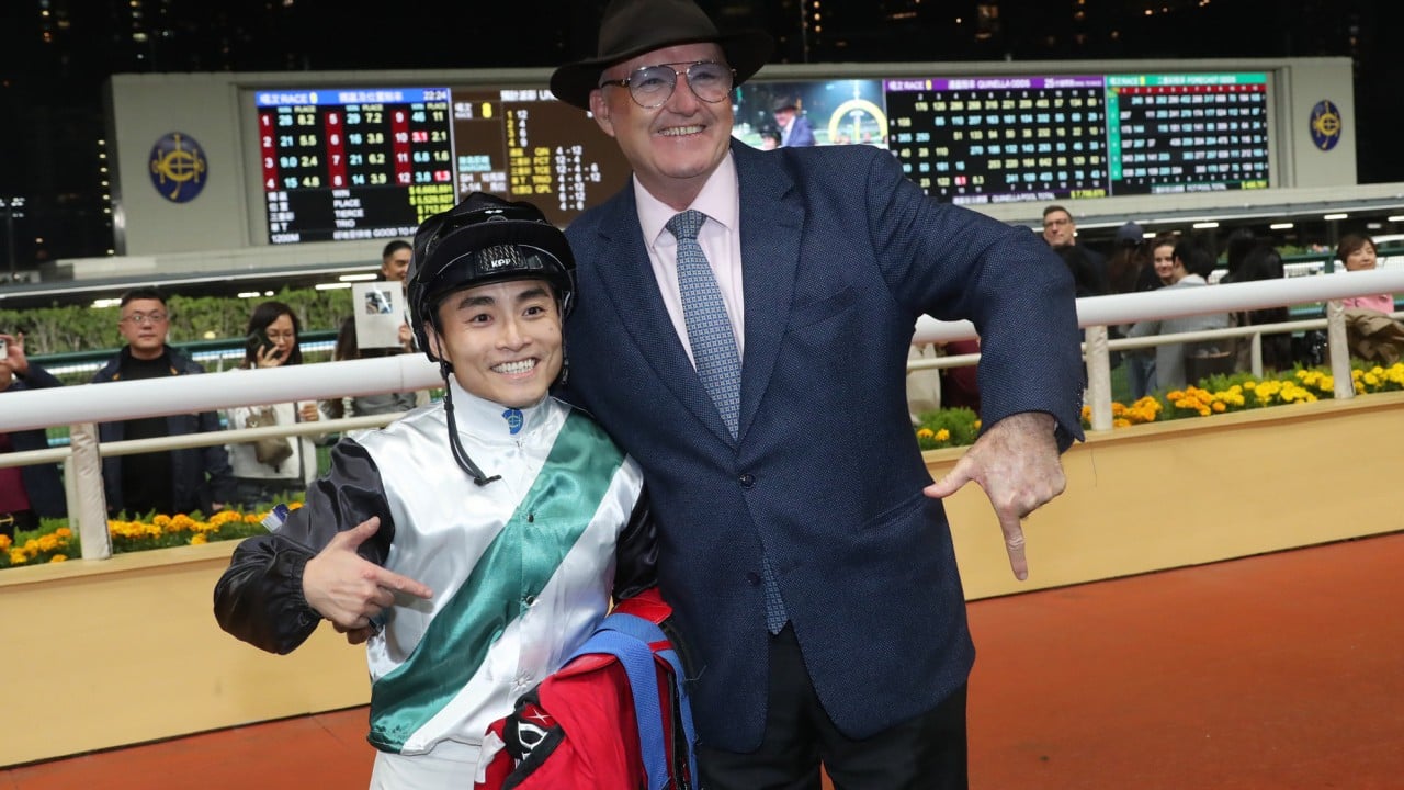 David Hayes and Keith Yeung celebrate the handler’s 700th win in Hong Kong.