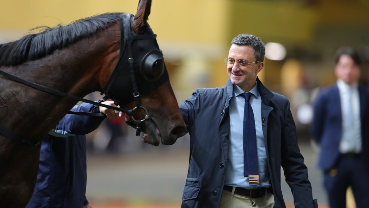 Trainer Douglas Whyte is all smiles after Giant Ballon’s victory.