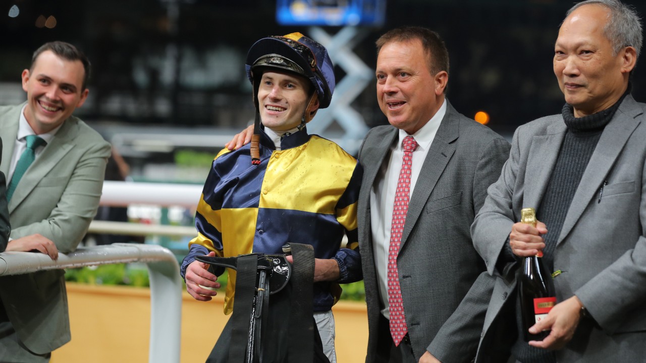 Jockey Luke Ferraris and trainer Caspar Fownes (second from right) celebrate Verbier’s win at Happy Valley. Photos: Kenneth Chan