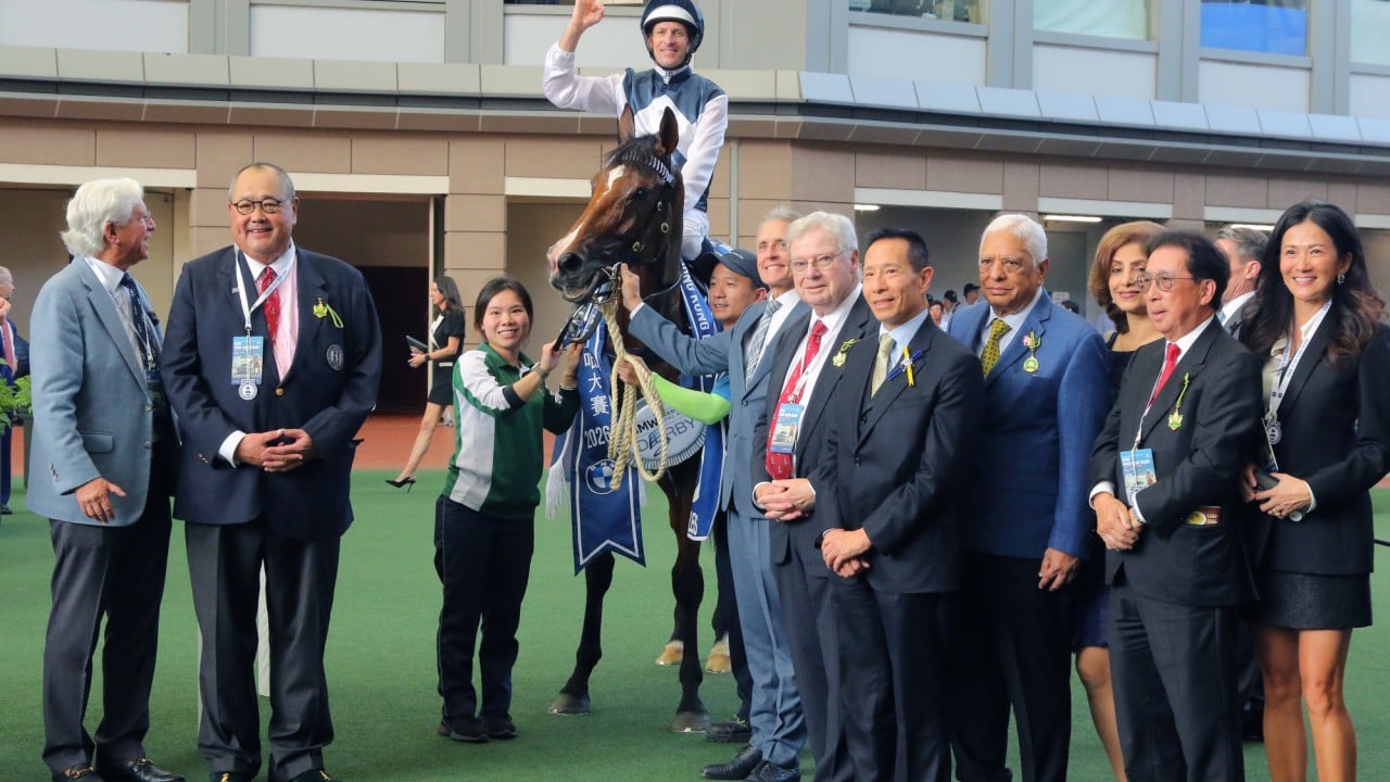 Connections of Invincible Ibis are all smiles after his Derby triumph.