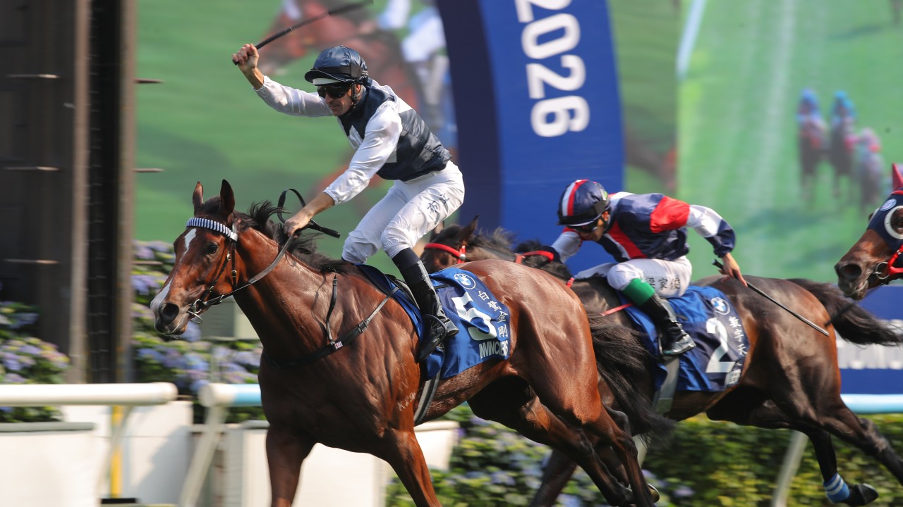 Hugh Bowman salutes after booting home Invincible Ibis in the 2026 Hong Kong Derby. Photos: Kenneth Chan