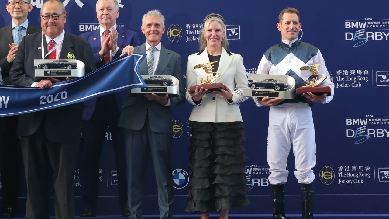 Trainer Mark Newnham, jockey Hugh Bowman and connections celebrate Invincible Ibis’ Derby success.