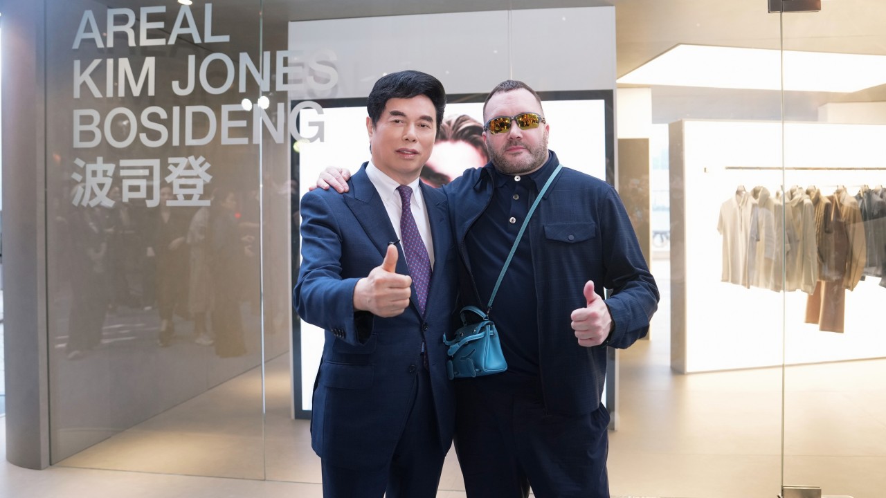 Bosideng chairman and CEO Gao Dekang with designer Kim Jones at an Areal pop-up in Hong Kong during Art Basel. Photo: Handout