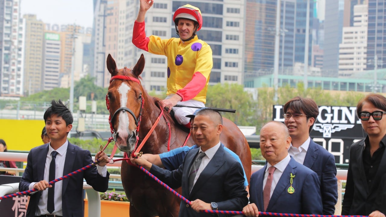 Hugh Bowman celebrates the win of Fantastic Fun at Happy Valley.
