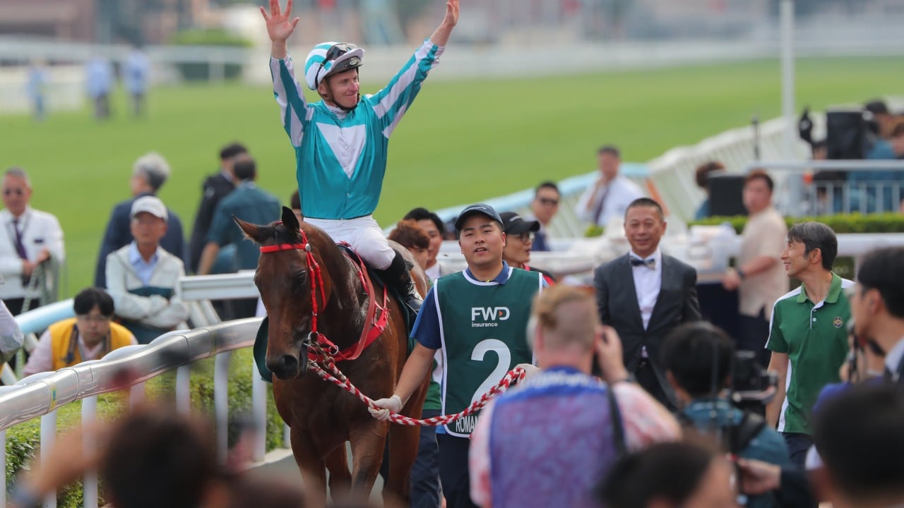 Romantic Warrior heads into the winner’s enclosure.