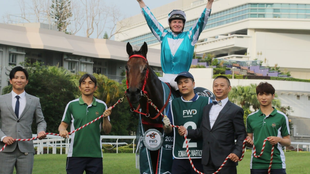Jockey James McDonald celebrates Romantic Warrior’s fourth QEII Cup win.
