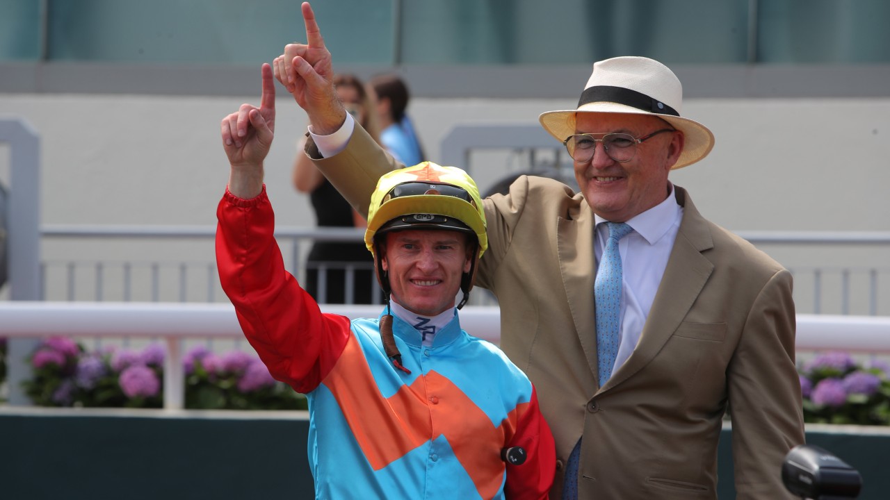 Jockey Zac Purton and trainer David Hayes celebrate Ka Ying Rising’s latest victory. Photos: Kenneth Chan