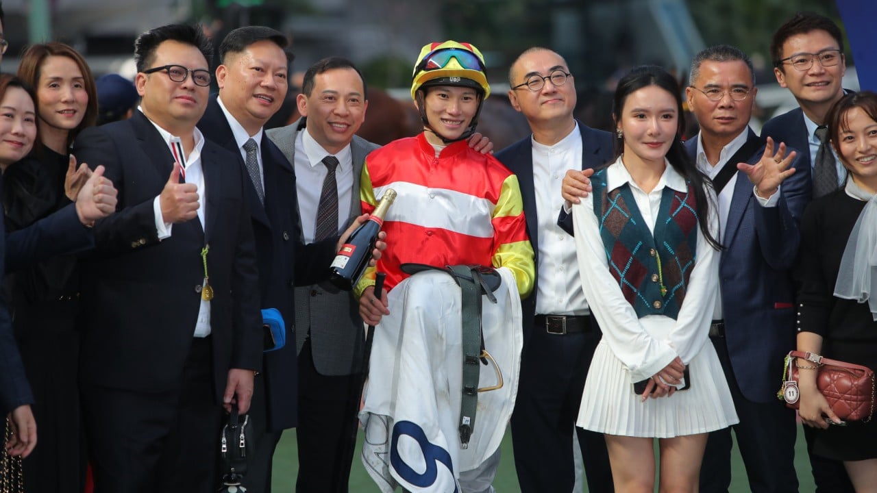 Connections celebrate the win of Emblazon at Sha Tin.